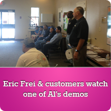 Eric & customers watch one of Al's demos