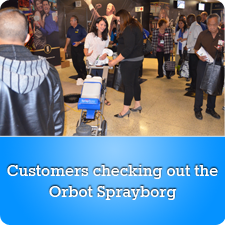 Customers checking out the Orbot Sprayborg