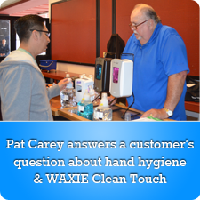 Pat Carey answers a customer's question about hand hygiene and WAXIE Clean Touch