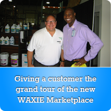 Giving a customer the grand tour of the new WAXIE Marketplace