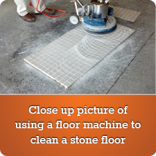 2013 Boise: Close up picture of using a floor machine to clean a stone floor