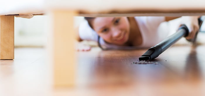 Vacuuming-Under-Furniture-267355733_700x329